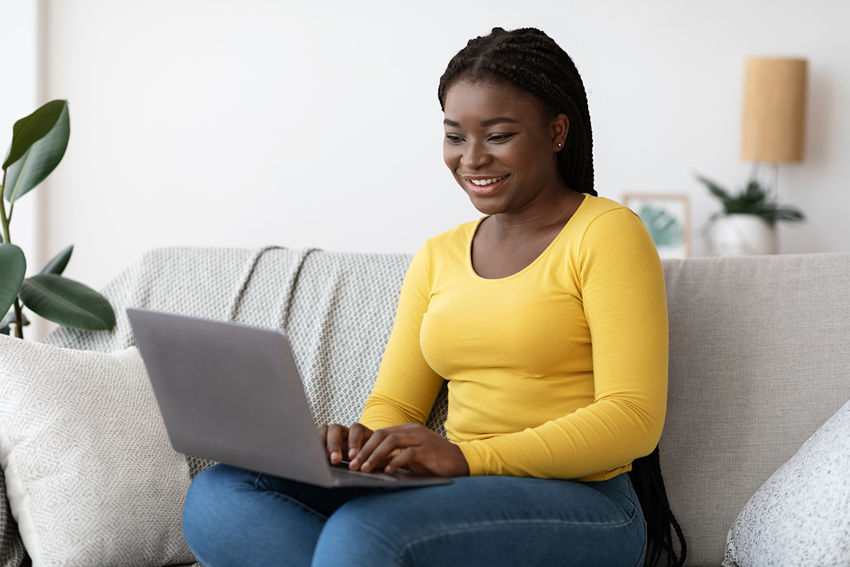 Woman with a laptop working from home