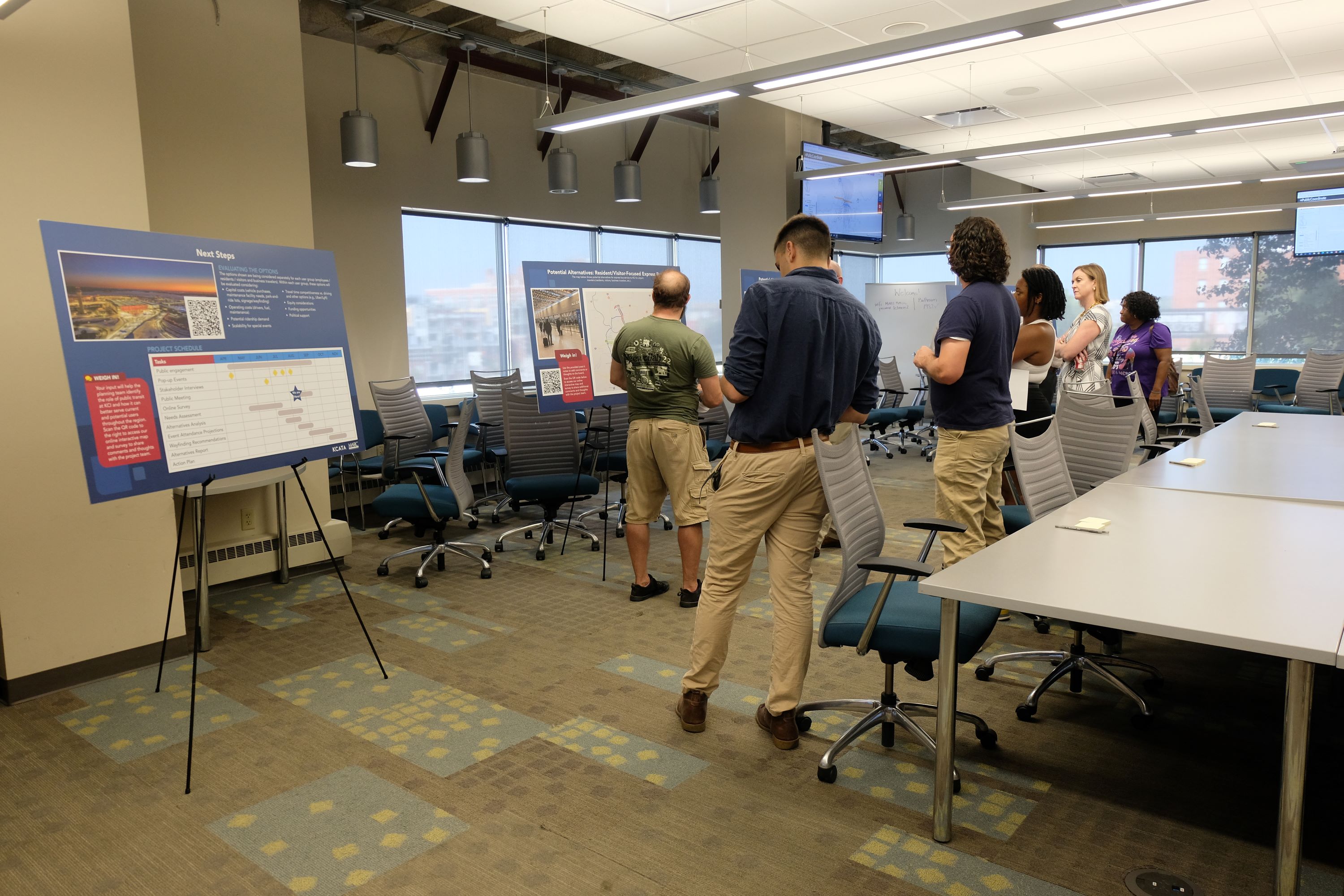 Attendees learning about the transit options at the KCI transit open house