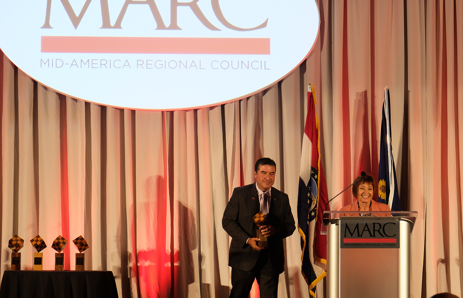 Marge Vogt at the podium during the 2026 Regional Assembly and Leadership Awards