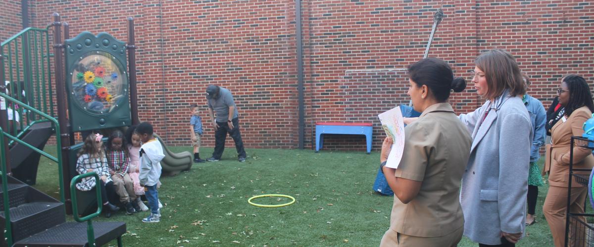 Visitors to a MARC Head Start program view new playground equipment.