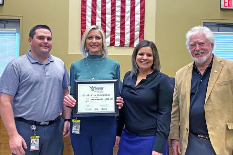 Grain Valley representatives accepting silver award from Communities for All Ages