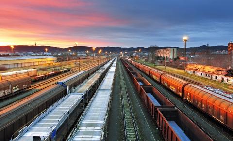 Freight trains heading off into the sunset