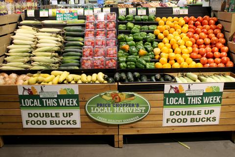 Fruits and vegetables on a grocery store display