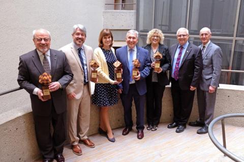 MARC’s 2019 Regional Leadership Award recipients: Ron Shaffer, Chris Thompson, Maria Meyers, David Slater, Desiree Monize, MARC Board 1st Vice Chair Jimmy Odom and Executive Director David Warm.