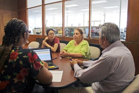 Community Health Workers at a table