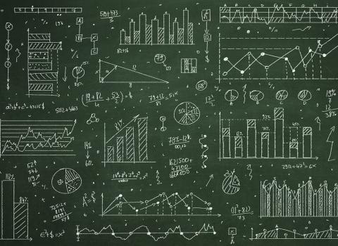 Charts and graphs drawn on a chalkboard