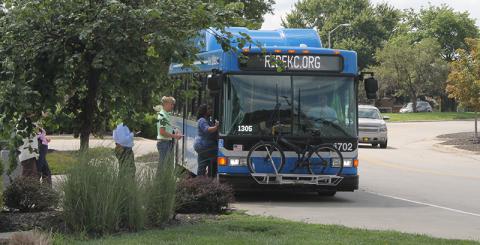 Passengers boarding a RideKC bus