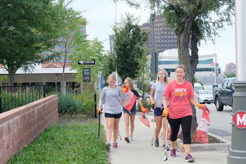 Group plogging along city streets