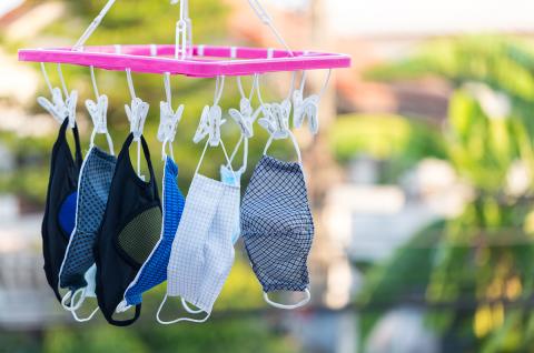 Reusable facemasks on a drying line