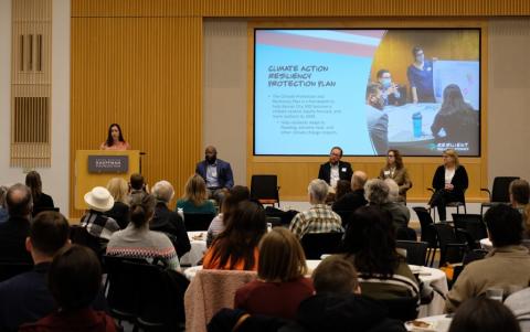 Lara Isch, Sustainability Manager for the City of Kansas City, Missouri, presenting her team's efforts in launching the city's Climate Protection and Resiliency Plan (CPRP)