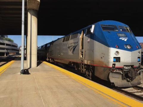 Amtrak train at a station track