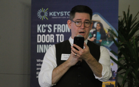 Darren Beck of Ingenuity LLC reads notes from his phone during Circular KC presentation at Keystone CoLAB