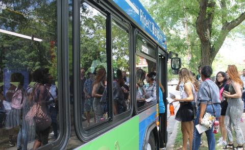 Group of young people boarding a Ride KC bus
