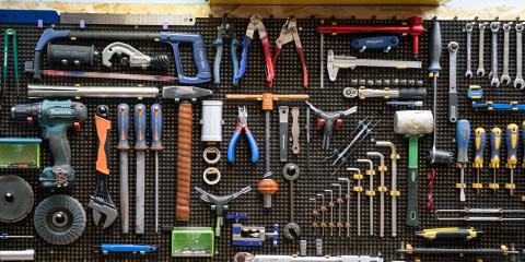 Tools organized on a peg board