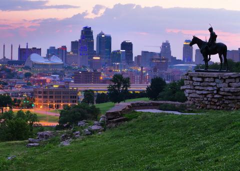View of Kansas City skyline with KC Scout statue in right foreground