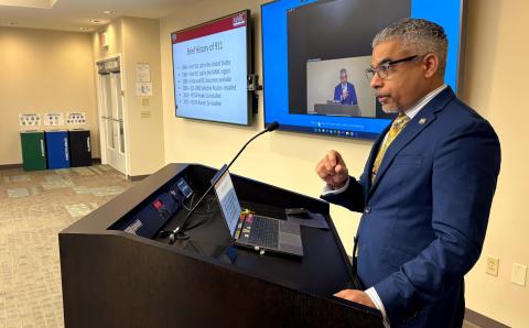 Hassan Al-Rubaie, technical services director, presents to the MARC Board about 911 upgrades. 