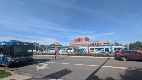 Plaza transit during the FIFA World Cup 2026™ Kansas City with streetcar, bus, bike and a car