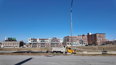 Truck on road with buildings in the background in Kansas City