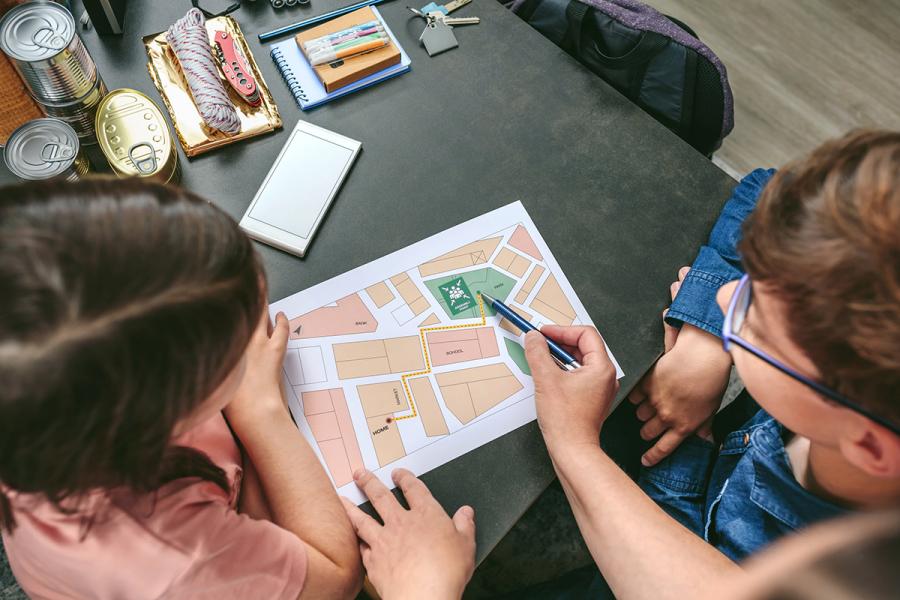 Family reviewing an emergency evacuation plan