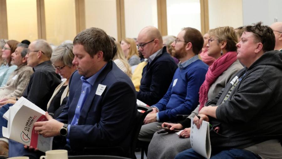 A group attending a presentation by Climate Action KC