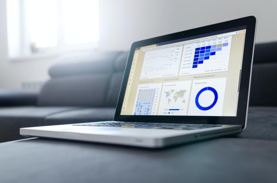 Laptop with charts and graphs