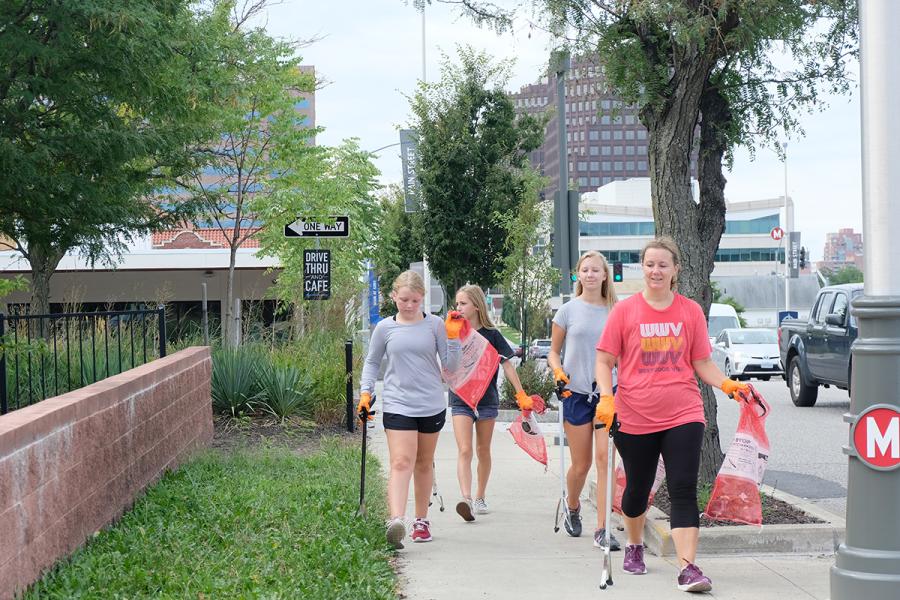 Group plogging along city streets