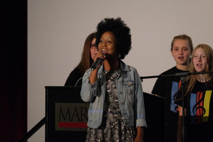 Julia Haile performs with the Kansas City Youth Chorus