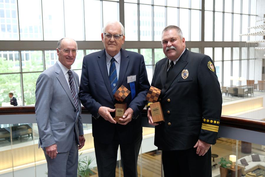 2022 Regional Leadership Award winners Ed Eilert and Dan Manley with MARC Executive Director David Warm