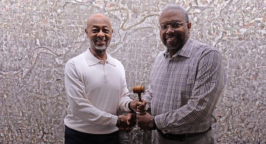 Passing of the gavel from Harold Johnson, Jr. to Carson Ross