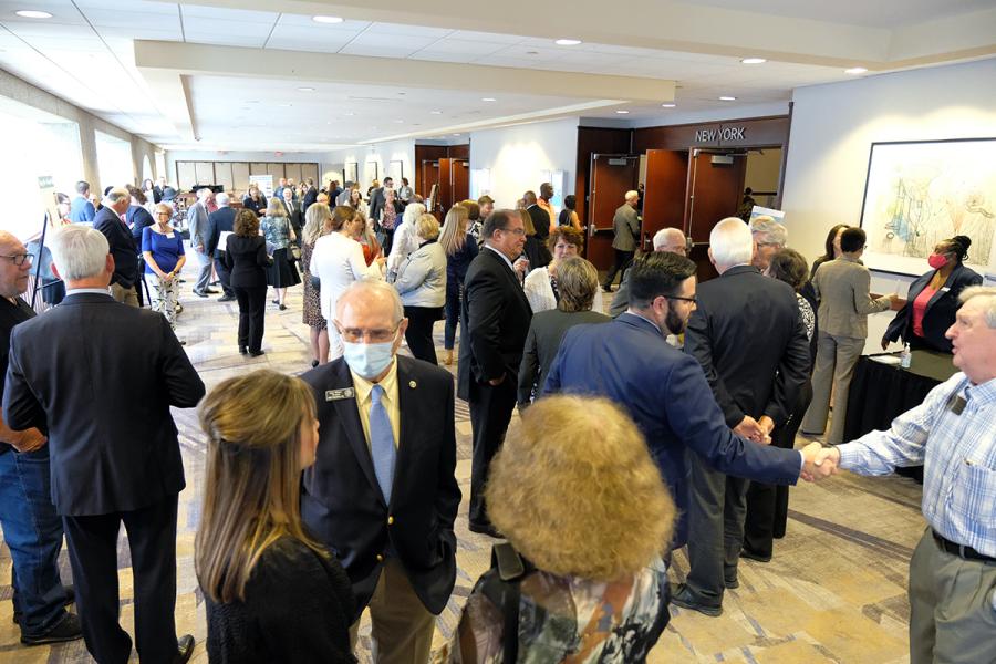 Guests at MARC's 2023 Regional Assembly gathering in lobby