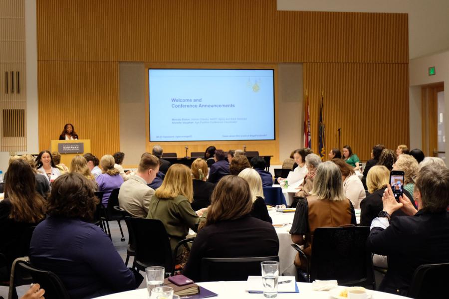 Melody Elston, interim director of MARC's Aging and Adult Services, welcomes conference attendees.