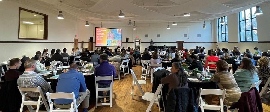 A group attending a presentation on the Kansas City regional economy