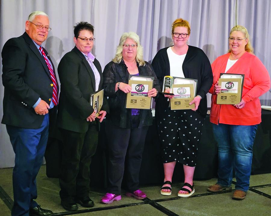 Telecommunicators receiving awards at the annual TAC celebration