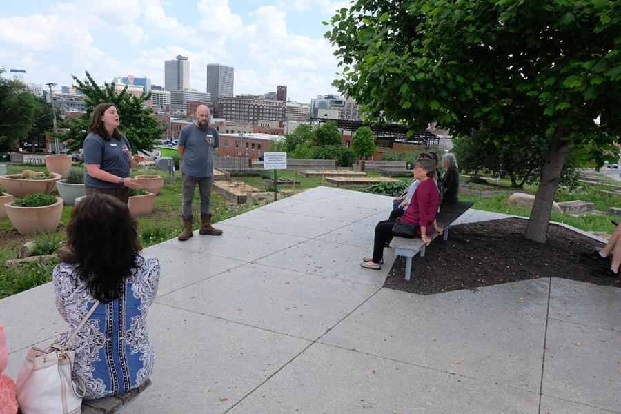A group of volunteers learning about an organization