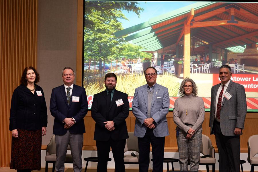 Group standing on stage during the 2025 Vibrant Success Stories event