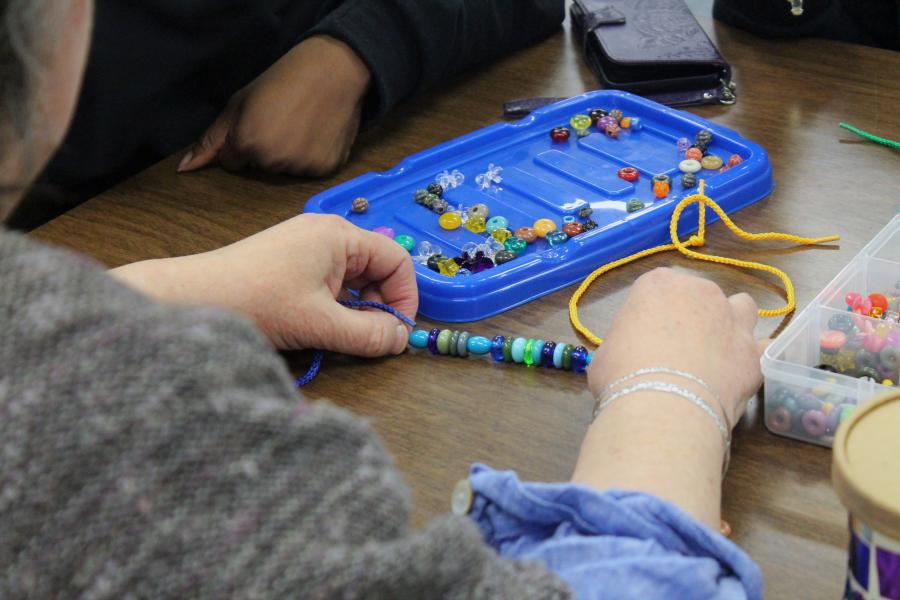 Attendees learned about making bead patters at the Seeds of Change recruitment event.