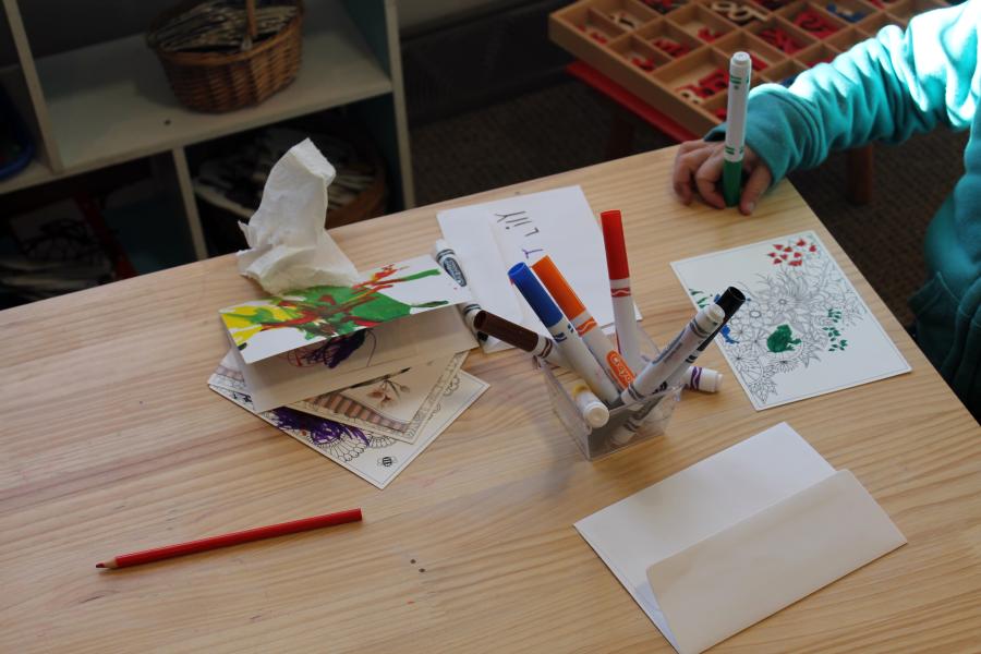 A child colors at Brookside Montessori in Kansas City, Missouri.