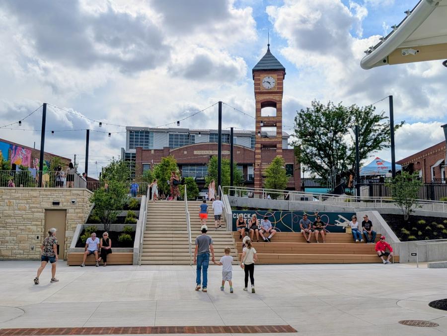 People walking through Clocktower Landing in downtown Overland Park